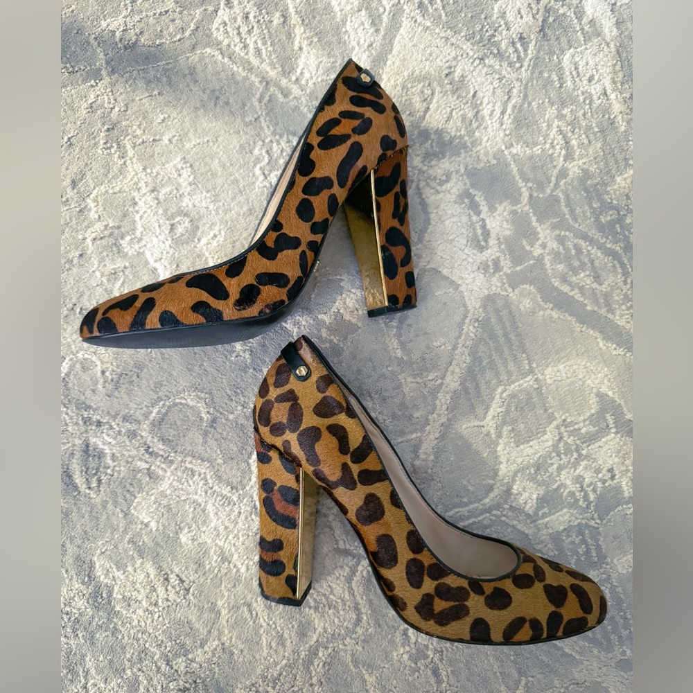 C. Wonder Leopard Calf Half Hair Heels